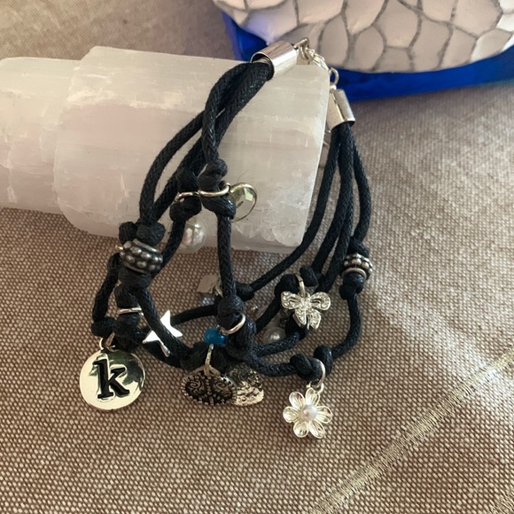 Aeropostale Jewelry - Aeropostale multi strand "K" Charm Bracelet black cord - perfect add to a bundle